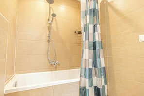 Apartment | Bathroom | Combined shower/tub, hair dryer, towels, soap