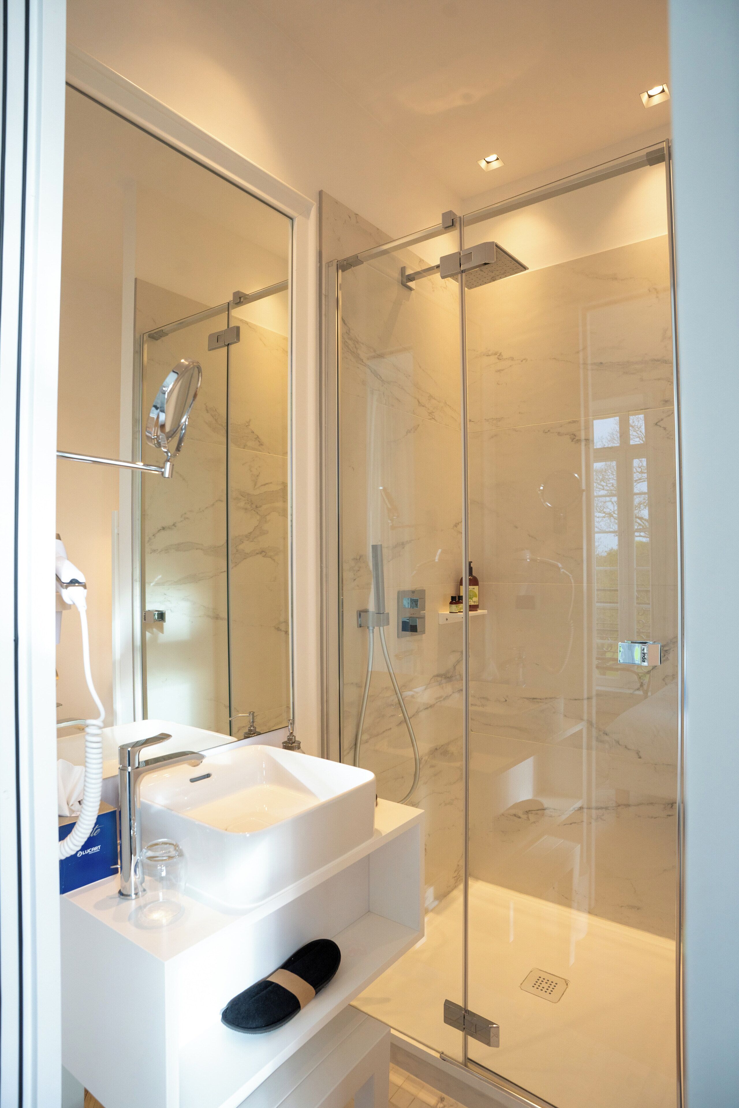 shower, free toiletries, hair dryer, bathrobes