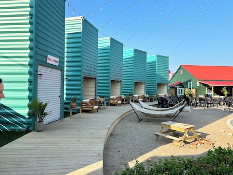 Outdoor dining. The Lazy Acre: Waterfront cottage with unparalleled views of Smith's Bay.