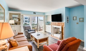 Smart TV, fireplace, DVD player, books