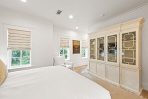 A bedroom with a large bed, a white wardrobe, and two windows with curtains. - Luxury Stay Near Beach Club with 4 Bikes (Santa Rosa Beach)