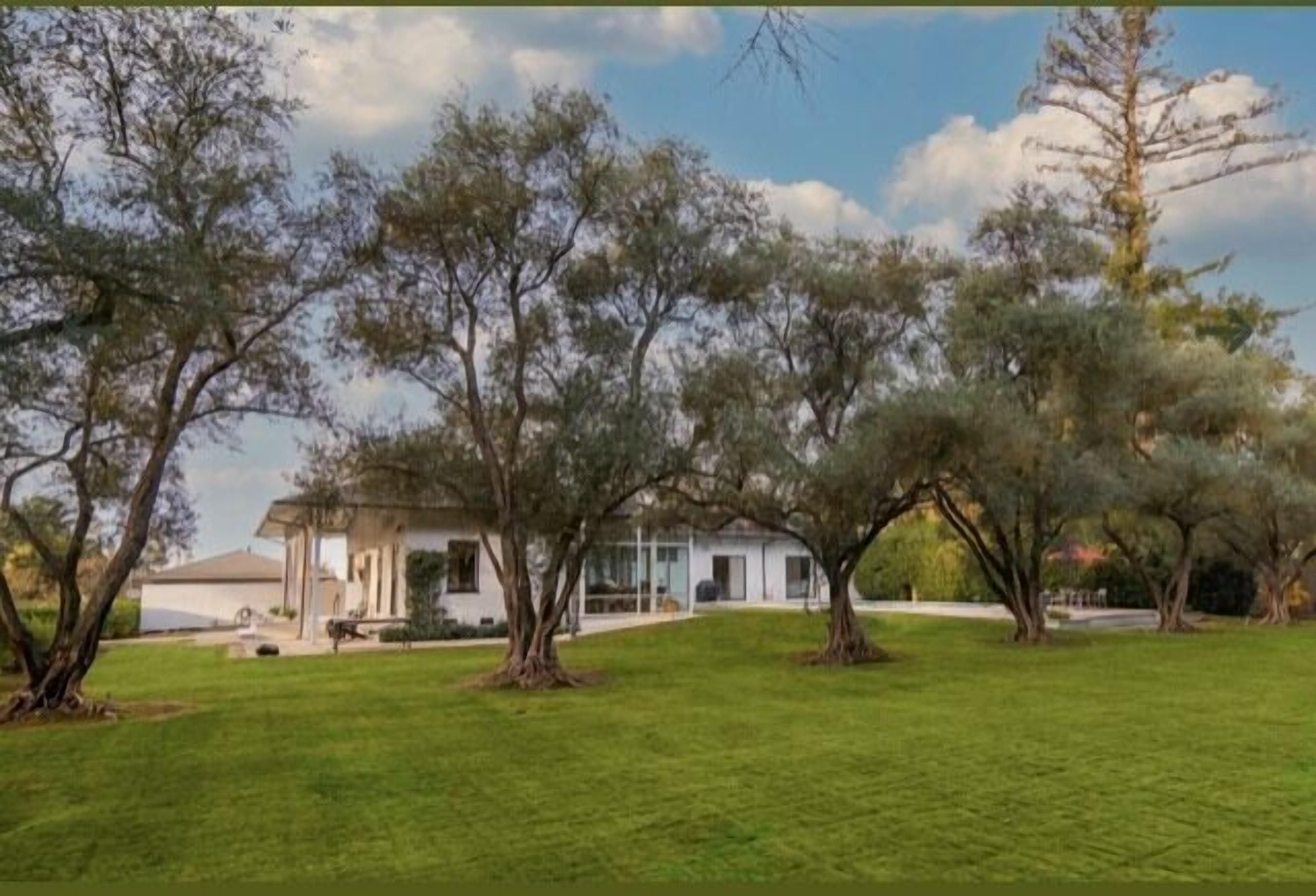 The Tennis House. A Mid-Century Modern River Getaway  