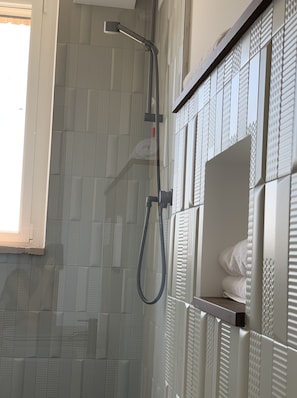 Quadruple Room | Bathroom | Shower, free toiletries, hair dryer, slippers
