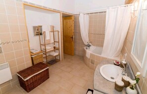 Hair dryer, towels, soap, toilet paper