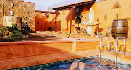 Rural house in a valley with sea views and swimming pool.