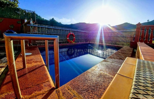 Rural house in a valley with sea views and swimming pool.