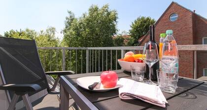 Comfortable apartment on the upper floor for 4 people with balcony, garden & terrace.