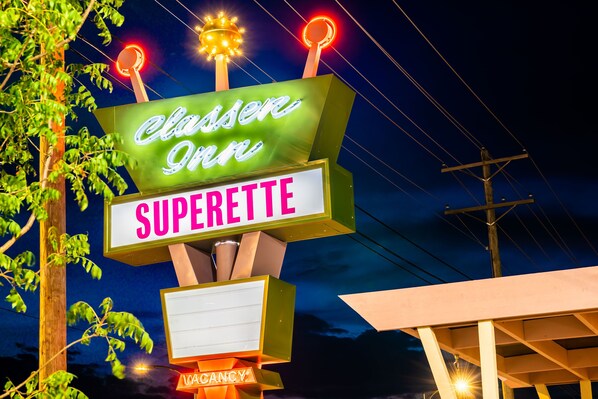 A neon sign for Claison Inn with a marquee and a marquee light. - Classen Inn (Oklahoma City)