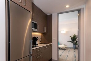 Fridge, microwave, stovetop, coffee/tea maker