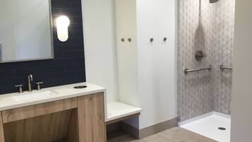 Bathtub, hair dryer, towels, soap