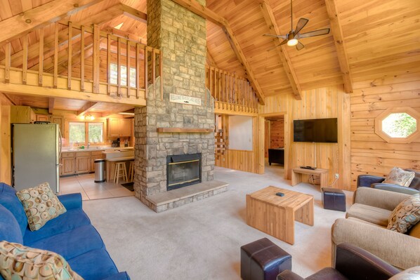 TV, DVD player, table tennis, books - Three-story dog-friendly home with large deck, wood swing, firepit, lawn, & more (Mineral)