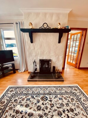 Cottage, Multiple Beds | Living room | 30-inch TV with satellite channels, fireplace - Riverside Cottage, Ramelton, The Wild Atlantic Way (Ramelton)
