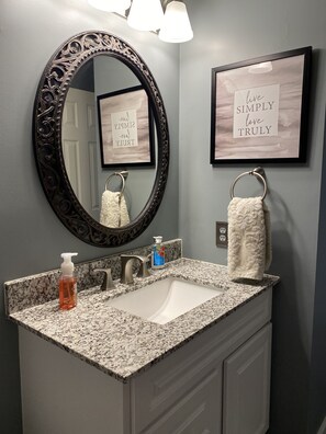 Bathtub, hair dryer, towels, soap