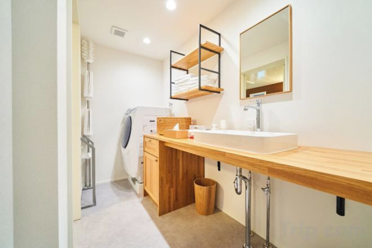 Separate tub and shower, free toiletries, hair dryer, slippers
