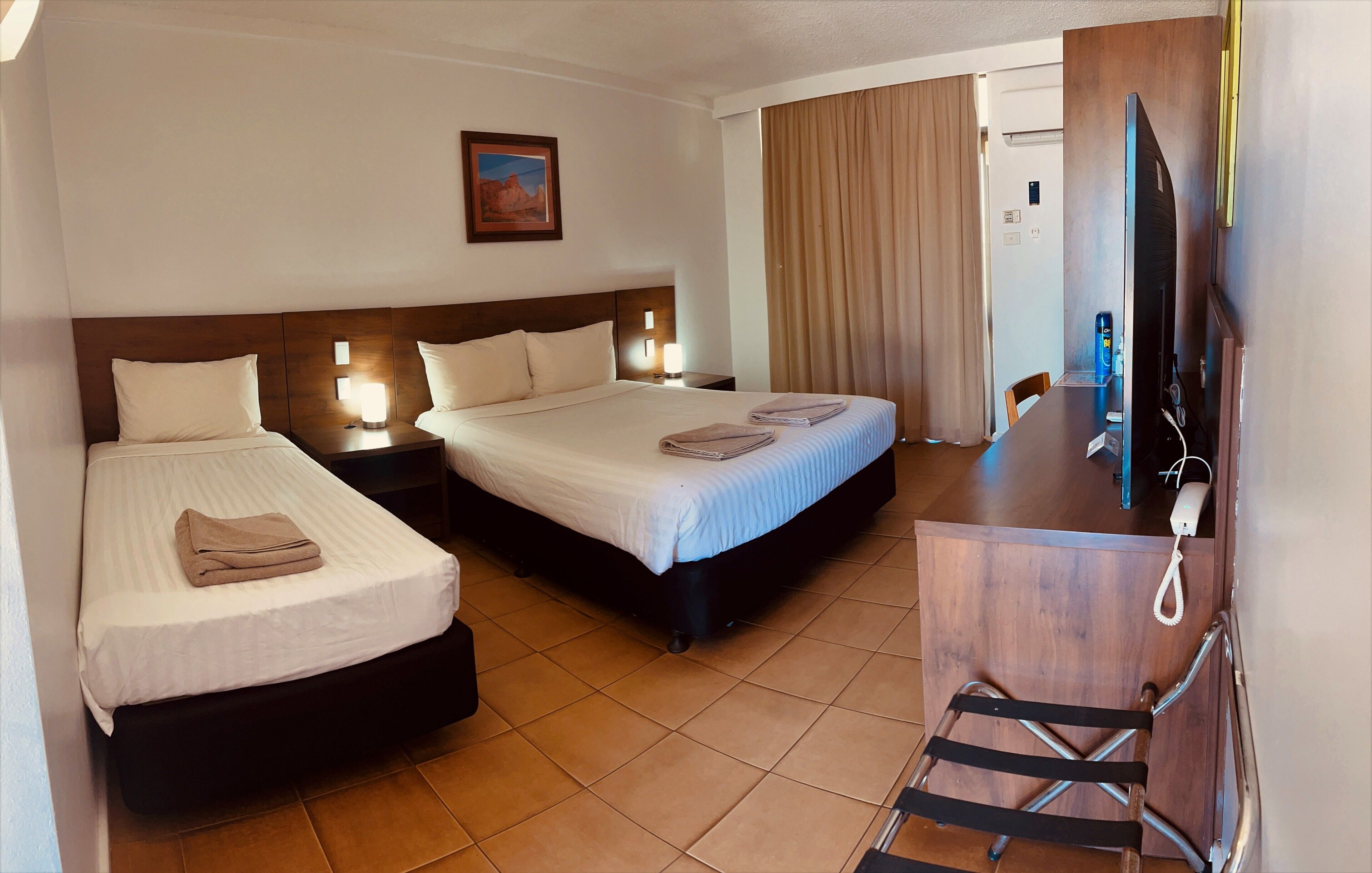 Desk, laptop workspace, blackout drapes, soundproofing