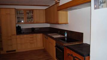 Apartemen | Dapur pribadi | Lemari es besar, microwave, oven, dan kompor