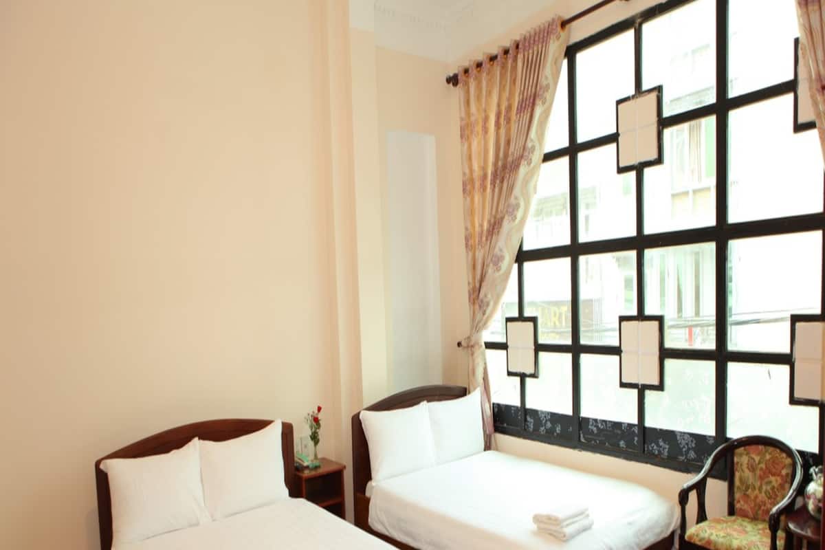 Desk, laptop workspace, free WiFi, bed sheets