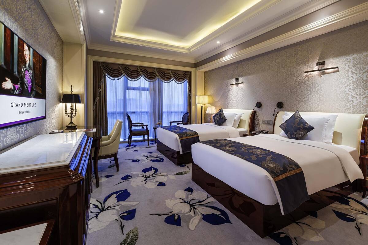 Habitación superior, 2 camas individuales | Cortinas opacas, wifi gratis, ropa de cama