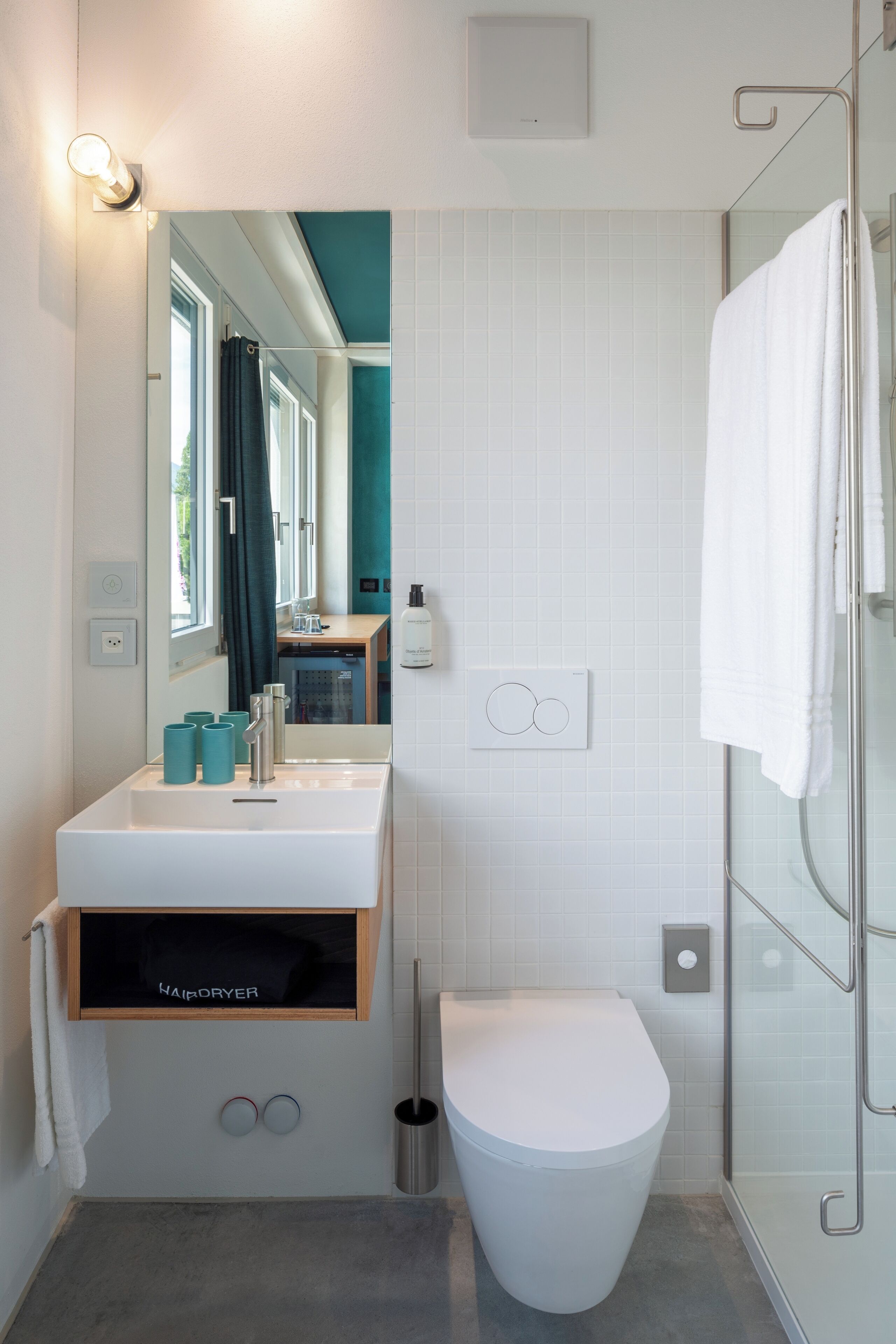 shower, eco-friendly toiletries, hair dryer, towels