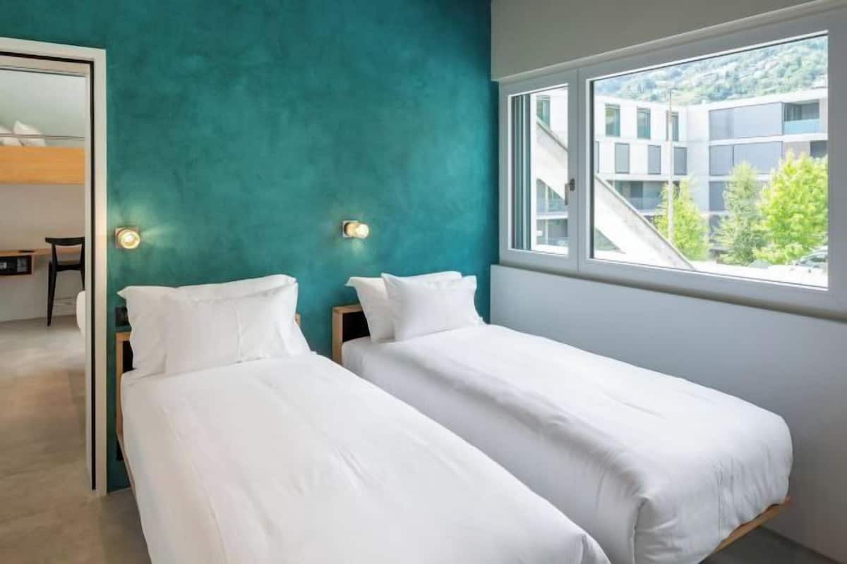 Edredón, camas con pillow-top y artículos del minibar gratis