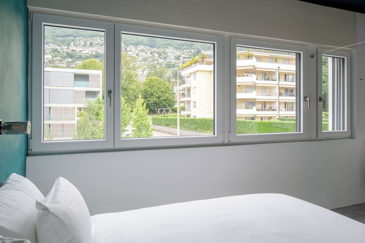 Habitación individual, vista a la montaña | Edredón, camas con pillow-top y artículos del minibar gratis