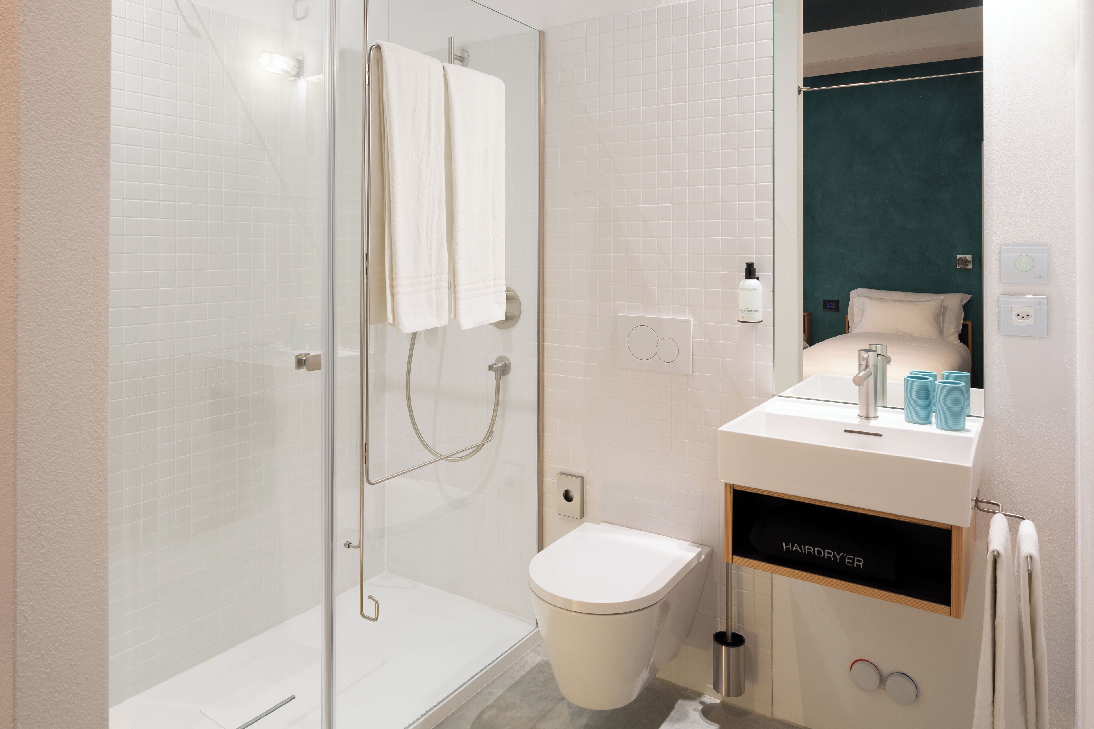 shower, eco-friendly toiletries, hair dryer, towels