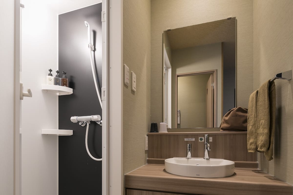 doubleroom(mountain view) shower booth, non smoking | bathroom | free toiletries, hair dryer, slippers, bidet