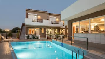 Outdoor pool, pool umbrellas, pool loungers