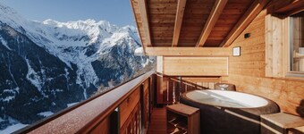 Holiday Home "Chalet Henne-Hochgruberhof" in Idyllic Mountain Location with Own Sauna