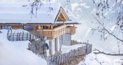 Holiday Home "Chalet Reisnock-Hochgruberhof" in Idyllic Mountain Location with Sauna