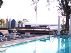 Outdoor pool - Comfortable & spacious one bed westcoast apartment, near shops, beach and pool.  (St. James)