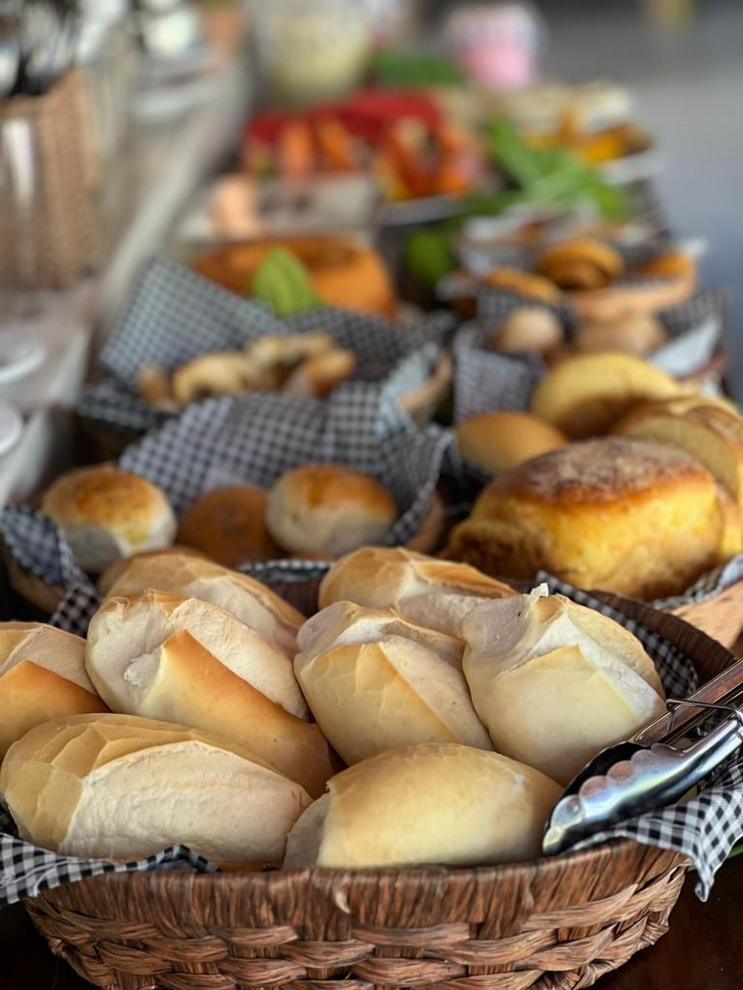 A variety of baked goods displayed in baskets.