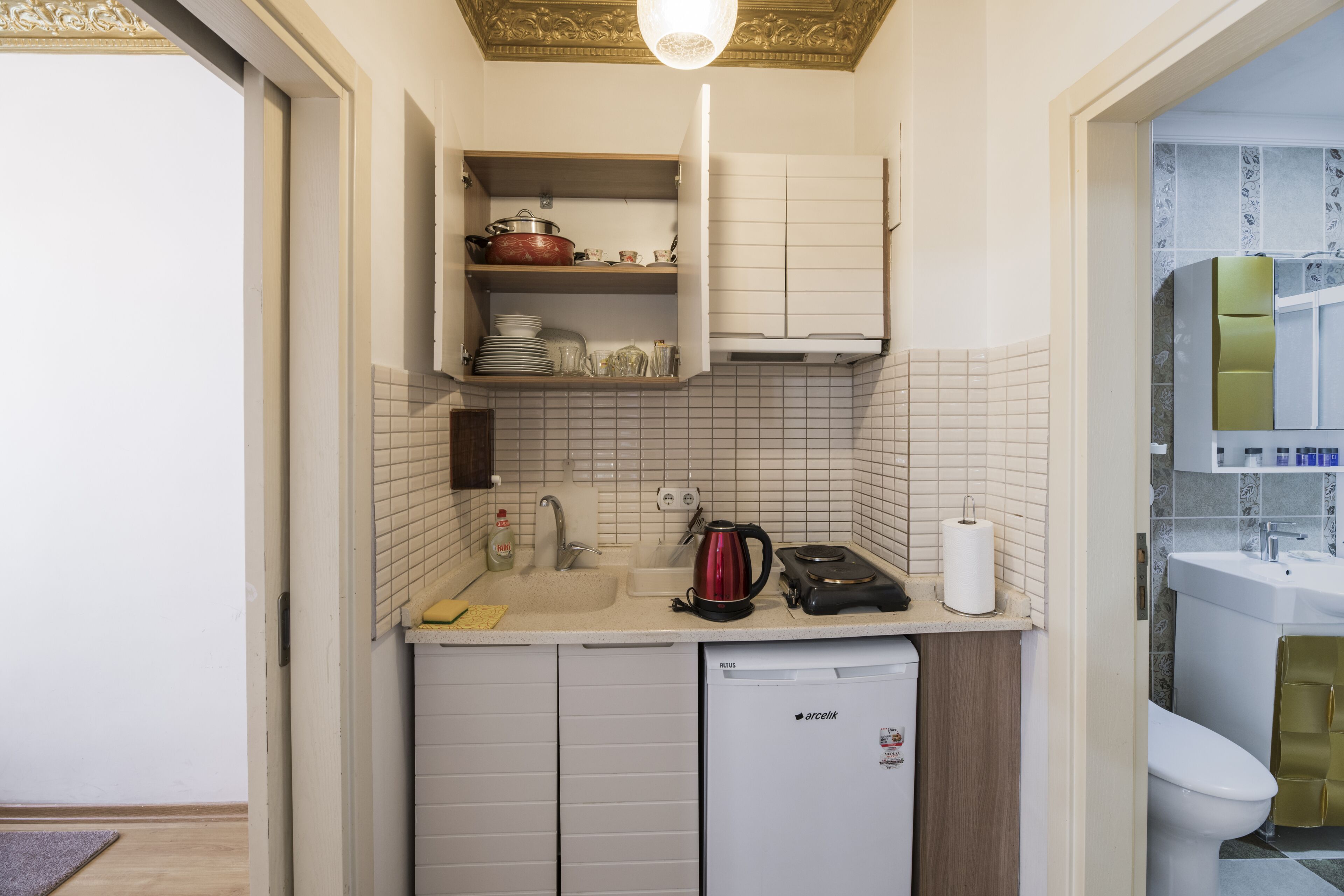 superior room | private kitchen | mini-fridge, electric kettle, cleaning supplies, paper towels