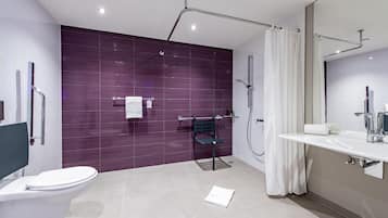Habitació amb dos llits individuals, dutxa accessible en cadira de rodes | Bany accessible
