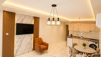 Apartment, Garden View | Private kitchen | Mini-fridge, microwave, stovetop, cookware/dishes/utensils