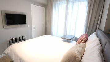 Quarto casal standard | Frigobar, ferros/tábuas de passar roupa, Wi-Fi de cortesia