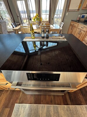 Fridge, microwave, oven, stovetop - Tranquil, cozy, luxurious family, pet and handicap friendly home in Luck, WI. (Luck)