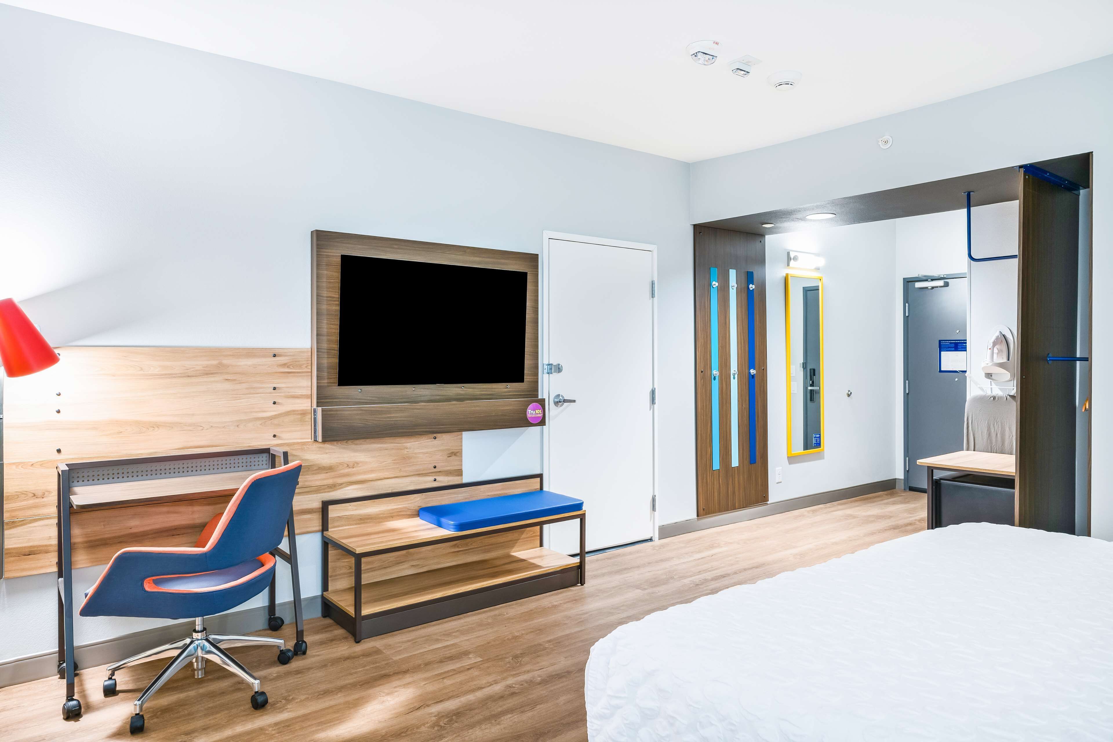 desk, blackout curtains, iron/ironing board, free cots/infant beds