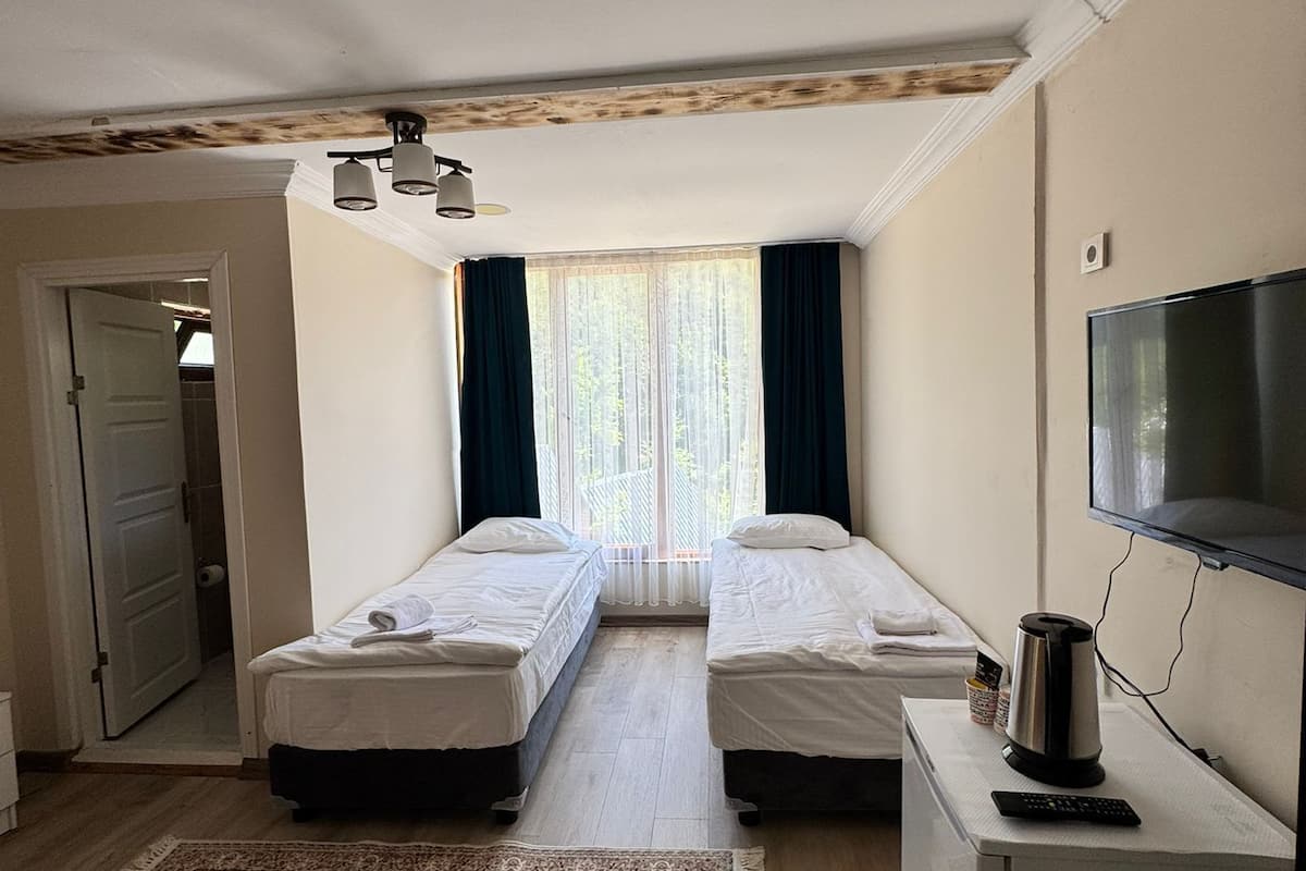 Bungalow Standard | 1 chambre, draps en coton égyptien, literie de qualité supérieure