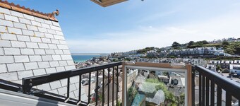 Treloweth, a large family home with sea views, parking and outside space, free WifI.