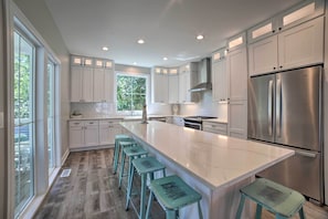 Fridge, microwave, stovetop, dishwasher - Bright & Airy Home: Chef's Kitchen & Pro Decor! (Michigan City)