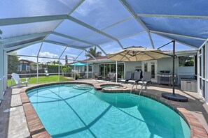 A heated pool, pool umbrellas
