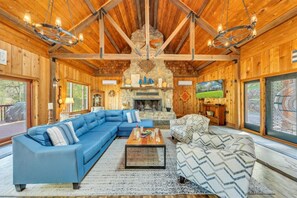 TV, fireplace, books - Mountain Lake Lodge - Dog-friendly cabin with gentle lot and firepit. (Moneta)