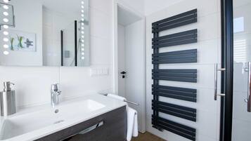 Hair dryer, towels, soap, toilet paper