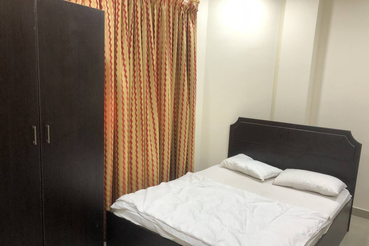 2 bedrooms, premium bedding, memory-foam beds, laptop workspace