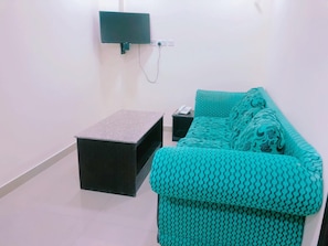 Basic Apartment | Living area | 32-inch LCD TV with cable channels, TV - Al Khobar Plaza (Manama)