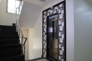 Elevator - StayBird - Nest, A Premium Residences (Pune)