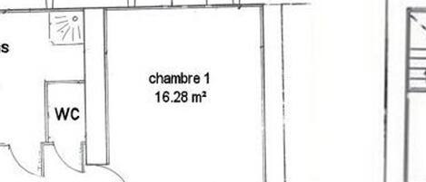 A floor plan of a room labeled 'chambre 1' with an area of 16.28 m², including a WC (water closet).