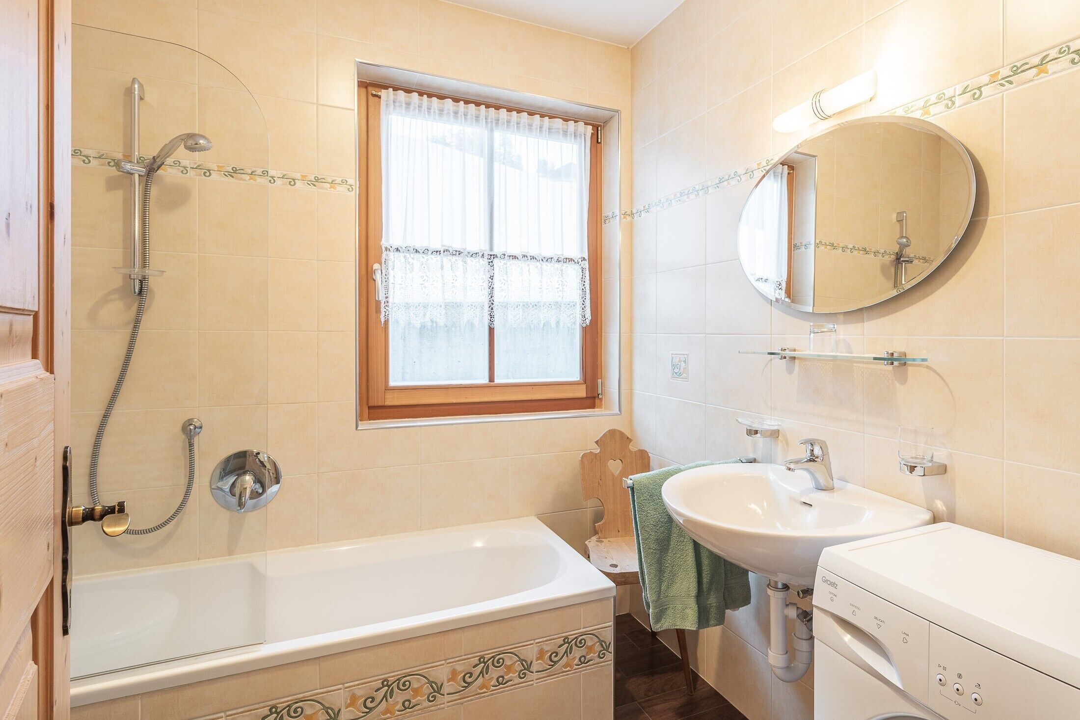 Bathtub, hair dryer, towels