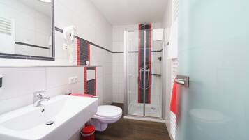 Standard Room | Bathroom | Shower, hair dryer, towels, soap